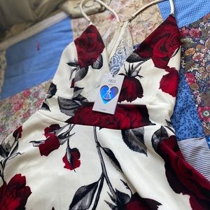 White dress with red roses